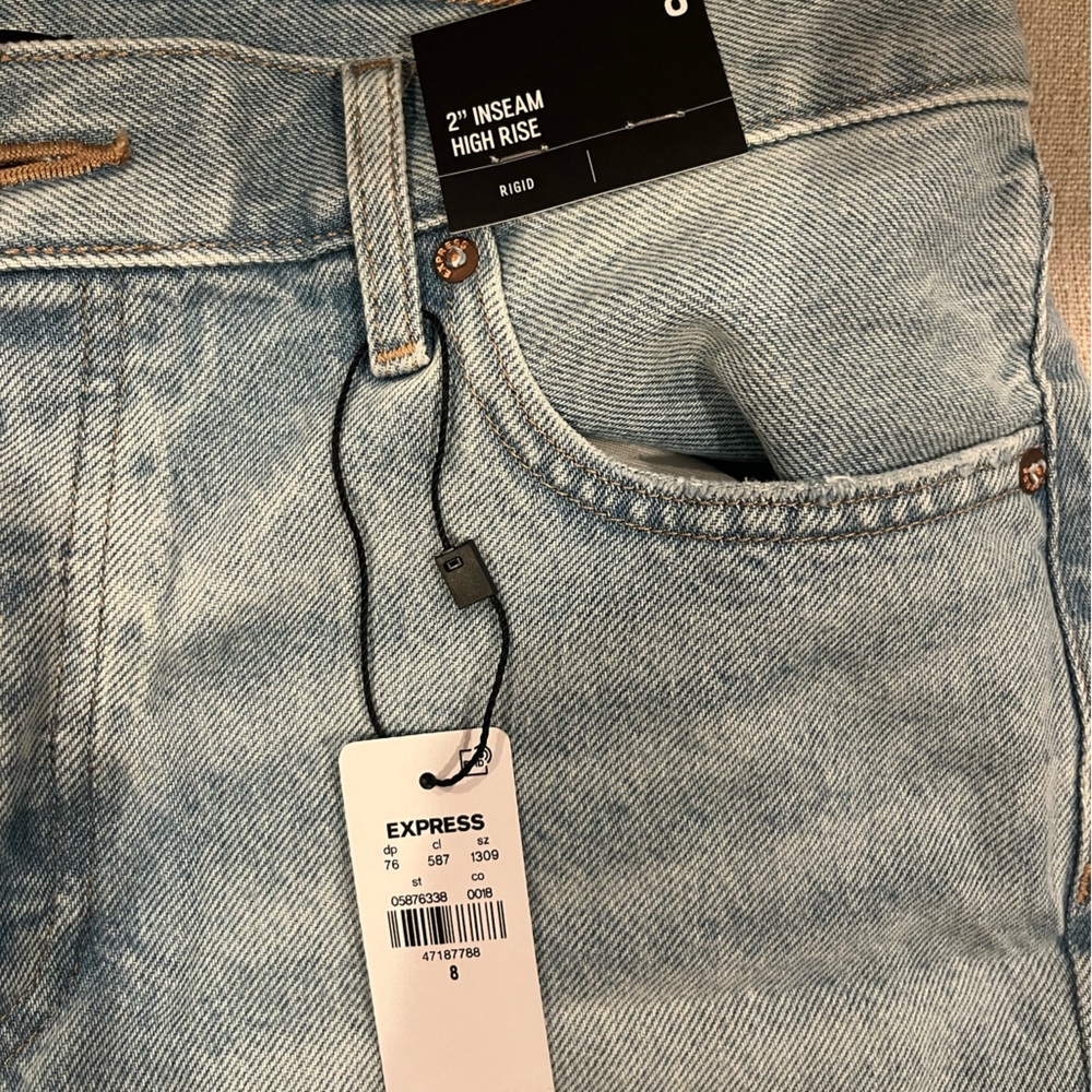 Brand new tags on high rise 5 button closure Jean shorts. Express. Size 8